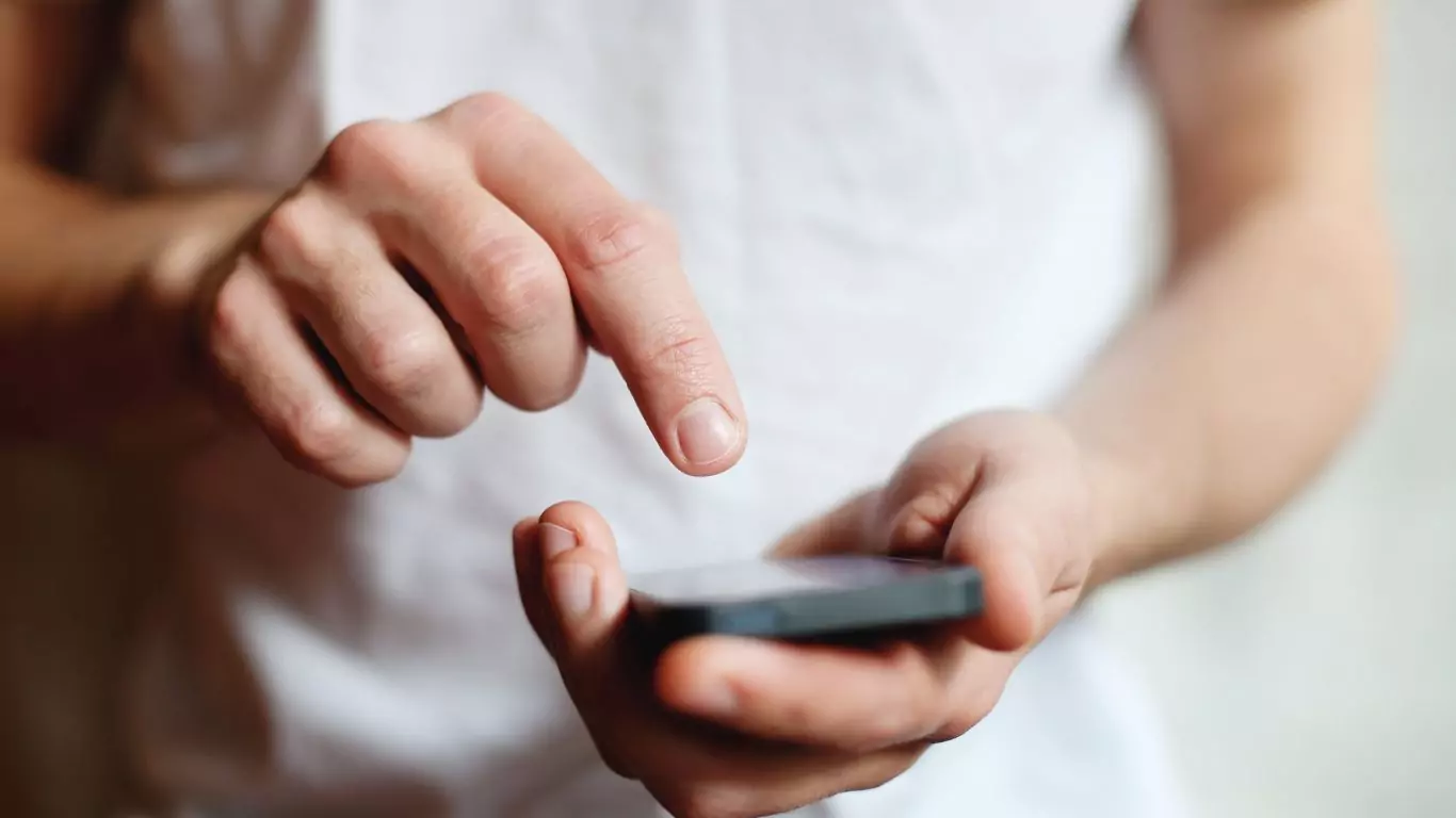 A man using his mobile phone
